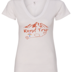white v-neck t-shirt with a mountain in the back saying road trip