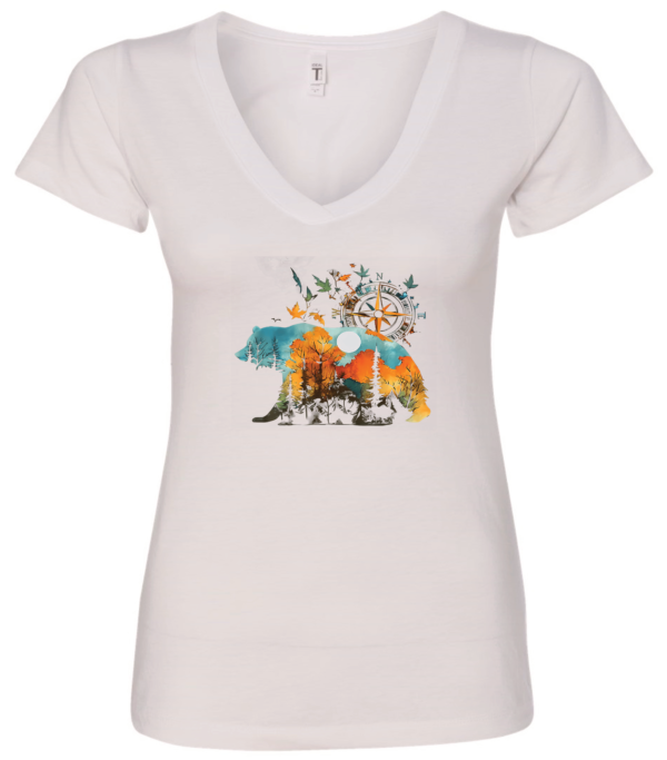 white v-neck t-shirt with a bear walking and a compass in th back, the bear has the forest printed on his body