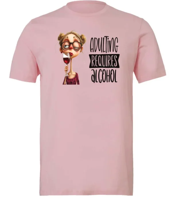 pink wine t-shirt featuring a young drunk woman wearing glasses holding a glass of wine and it says adulting requires alcohol