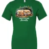 green camping t-shirt featuring a camper in the woods in the night with open doors with a quote saying adventure awaits