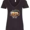 black camping v-neck t-shirt featuring a camper in the woods in the night with open doors with a quote saying adventure awaits