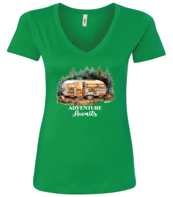 green camping v-neck t-shirt featuring a camper in the woods in the night with open doors with a quote saying adventure awaits