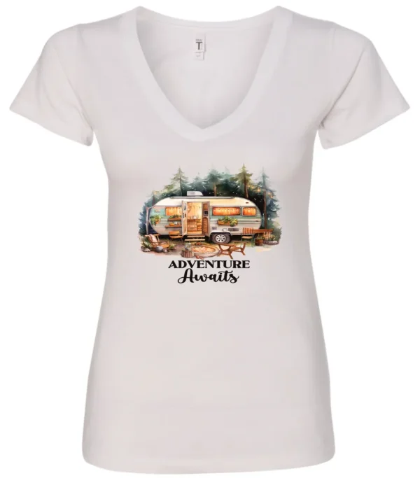 white camping v-neck t-shirt featuring a camper in the woods in the night with open doors with a quote saying adventure awaits