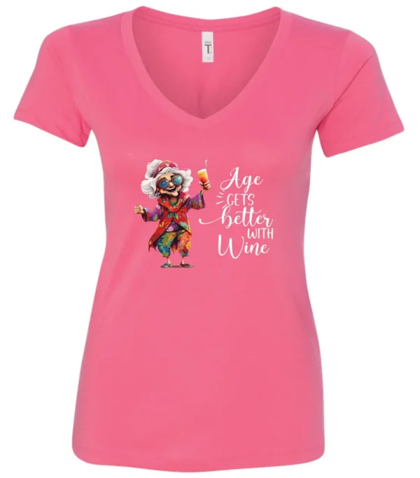 pink funny wine v-neck t-shirt featuring a happy old hippie woman with funny glasses holding a cocktail and it says age gets better with wine
