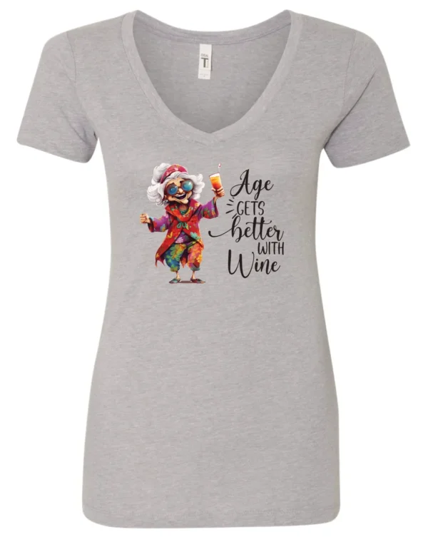 silver funny wine v-neck t-shirt featuring a happy old hippie woman with funny glasses holding a cocktail and it says age gets better with wine