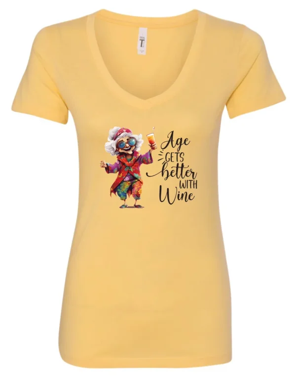 yellow funny wine v-neck t-shirt featuring a happy old hippie woman with funny glasses holding a cocktail and it says age gets better with wine