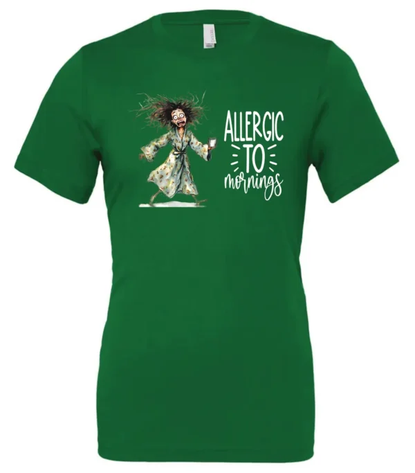 green funny coffee t-shirt featuring a disheveled woman with scared face running in pajamas and a cup of coffee, it says allergic to mornings