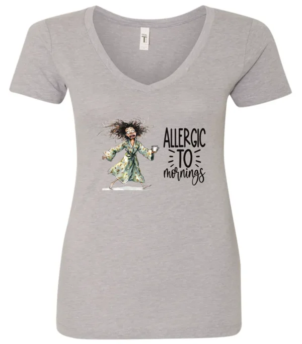 silver funny coffee v-neck t-shirt featuring a disheveled woman with scared face running in pajamas and a cup of coffee, it says allergic to mornings