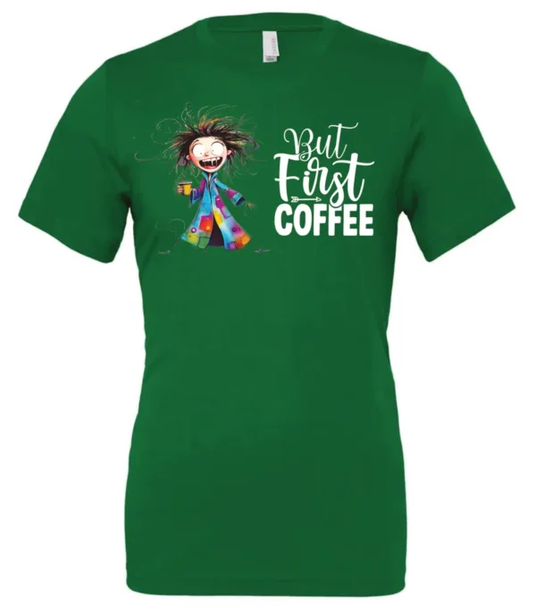 green coffee addict t-shirt featuring a disheveled young woman with surprised face in pajamas and a cup of coffee, it says but first coffee