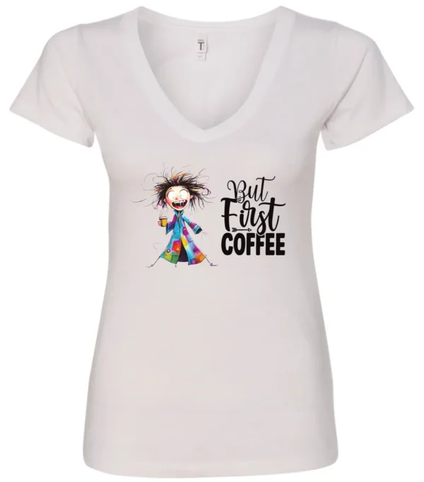 white coffee addict v-neck t-shirt featuring a disheveled young woman with surprised face in pajamas and a cup of coffee, it says but first coffee