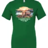 green camp life t-shirt featuring an old model camper in the lake with the mountains and sunrise as background, and it says camping mode on