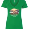 green camp life v-neck t-shirt featuring an old model camper in the lake with the mountains and sunrise as background, and it says camping mode on