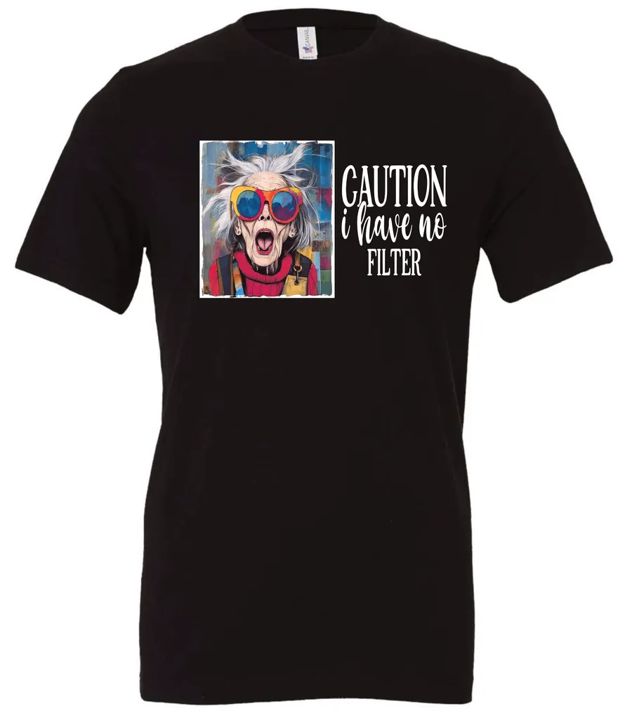 black sarcasm t-shirt featuring a funny design of a disheveled older woman with white hair and big glasses, saying Caution: I have no filter