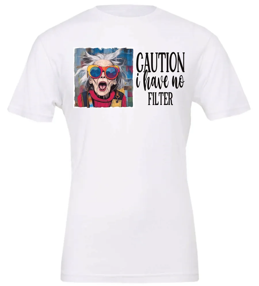 white sarcasm t-shirt featuring a funny design of a disheveled older woman with white hair and big glasses, saying Caution: I have no filter