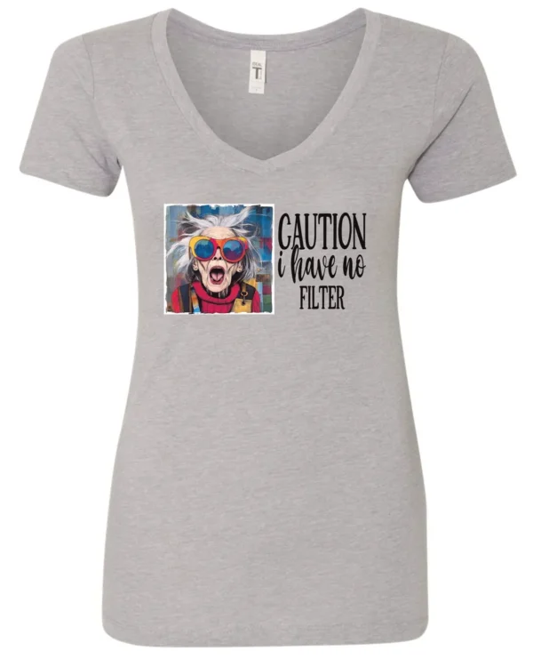 silver sarcasm v-neck t-shirt featuring a funny design of a disheveled older woman with white hair and big glasses, saying Caution: I have no filter
