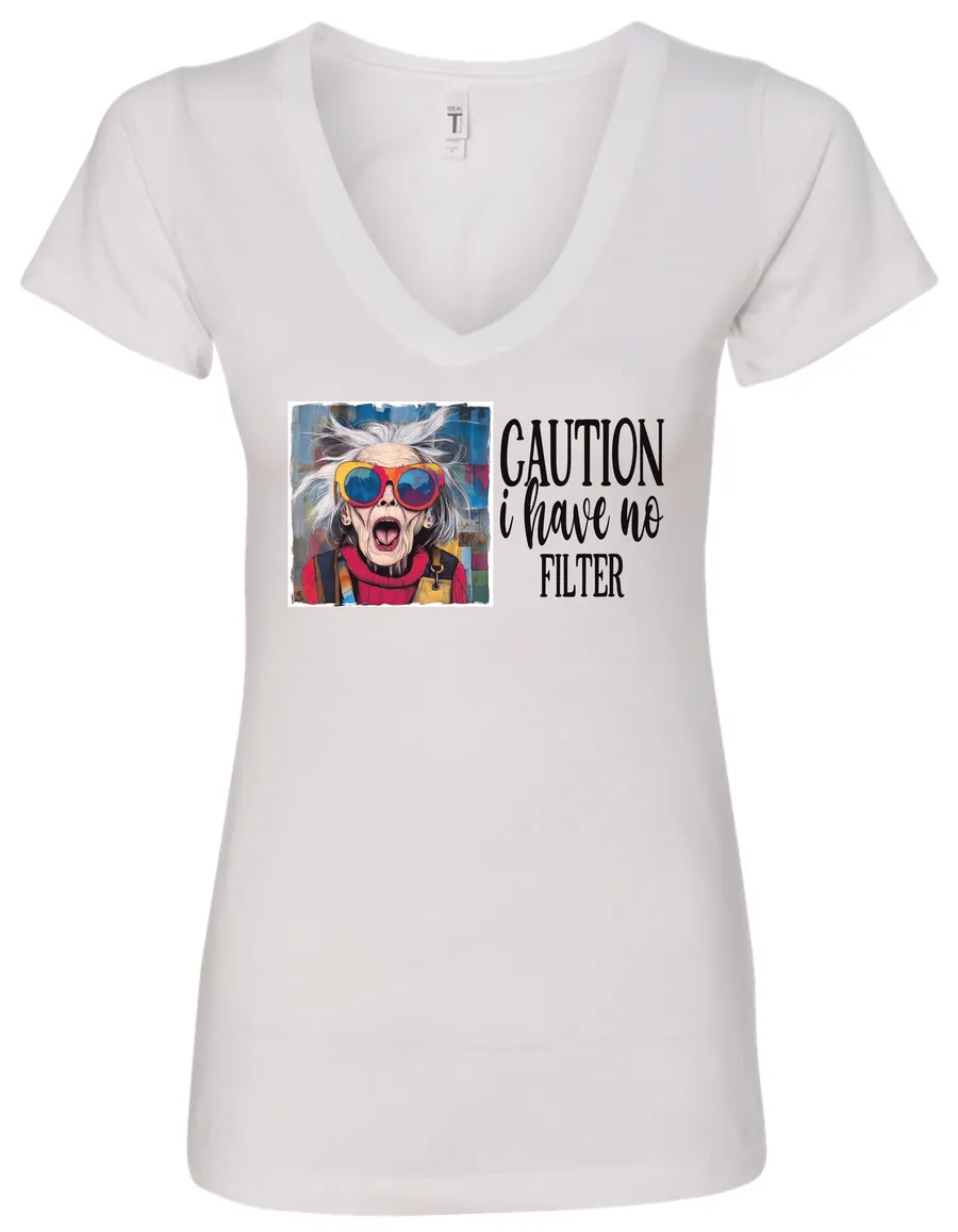 white sarcasm v-neck t-shirt featuring a funny design of a disheveled older woman with white hair and big glasses, saying Caution: I have no filter