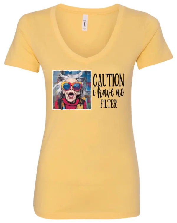 yellow sarcasm v-neck t-shirt featuring a funny design of a disheveled older woman with white hair and big glasses, saying Caution: I have no filter