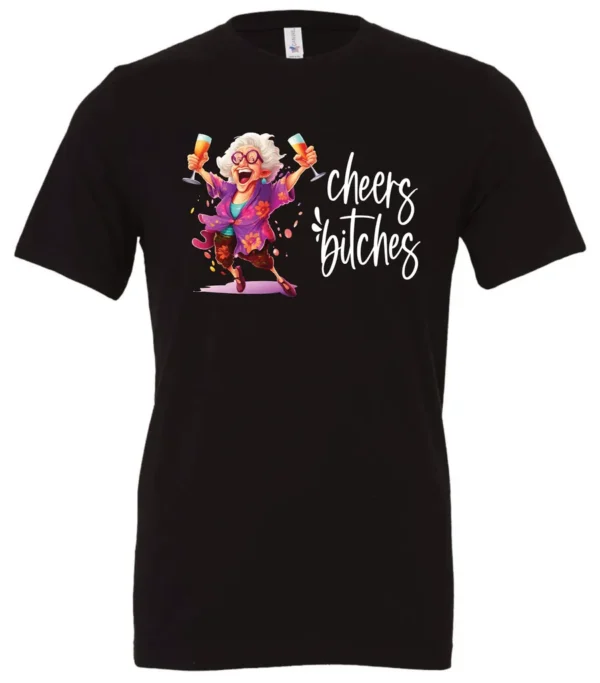 black funny cocktail t-shirt featuring a drunk old woman with glasses dancing and holding a glass of cocktail in each hand and it says cheers bitches