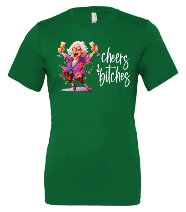 green funny cocktail t-shirt featuring a drunk old woman with glasses dancing and holding a glass of cocktail in each hand and it says cheers bitches