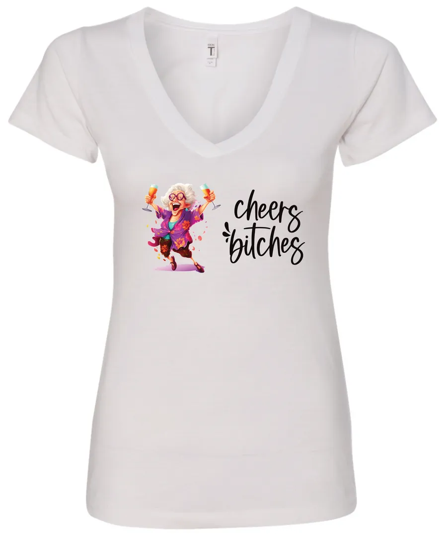 white funny cocktail v-neck t-shirt featuring a drunk old woman with glasses dancing and holding a glass of cocktail in each hand and it says cheers bitches