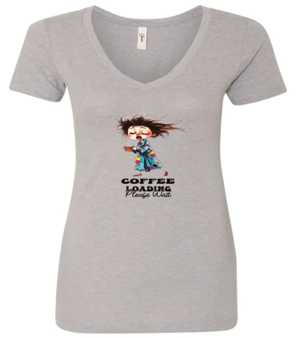 silver coffee v-neck t-shirt featuring a disheveled young woman with eyes closed in pajamas with a cup of coffee, it says coffee loading please wait
