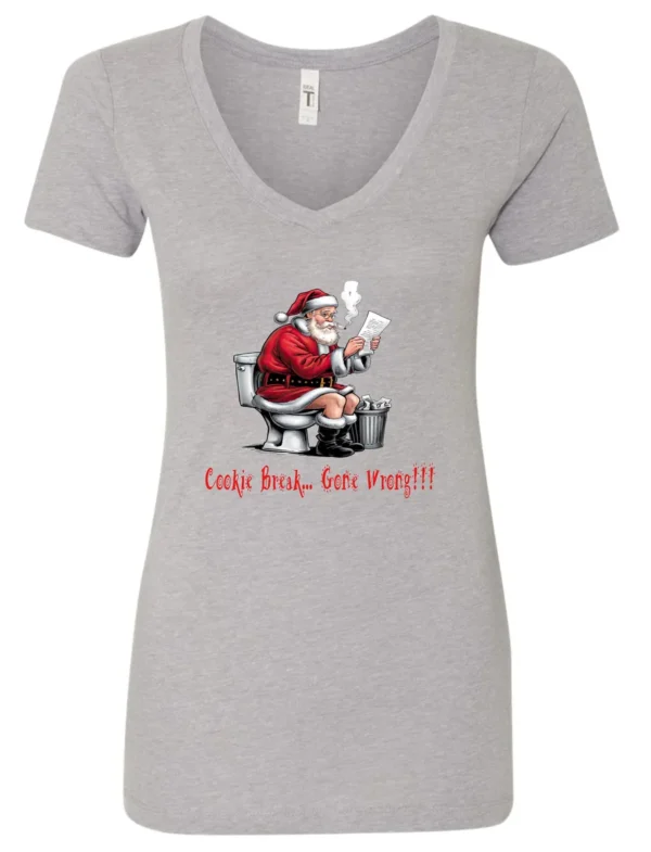 silver Christmas humor v-neck t-shirt featuring santa claus sitting on the toilet, reading the newspaper and smoking a cigarette, and it says cookie break gone wrong