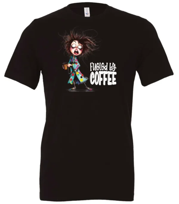 black coffee lover t-shirt featuring a disheveled young woman who just woke up in pajamas with a cup of coffee it says fueled by coffee