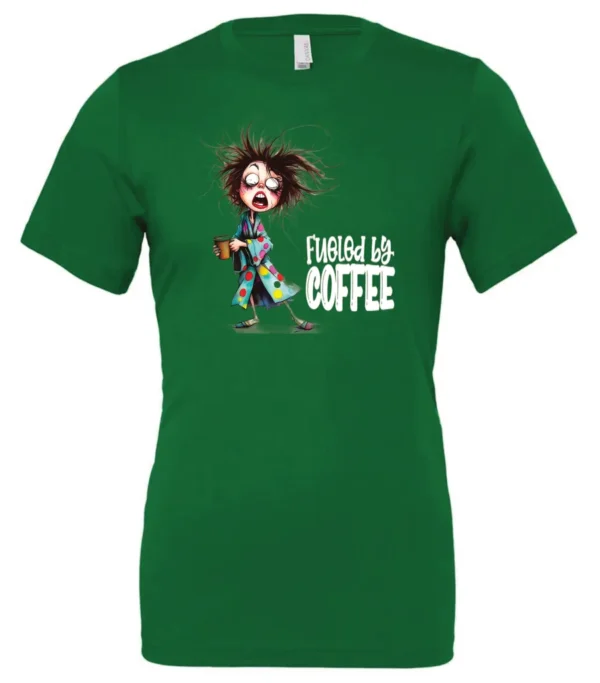 green coffee lover t-shirt featuring a disheveled young woman who just woke up in pajamas with a cup of coffee it says fueled by coffee