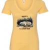 yellow camper v-neck t-shirt featuring an old model camper set up in the woods with night lights outside, and it says happy camper