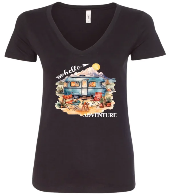 black camping v-neck t-shirt featuring a camper, picnic table set outside, and a sunrise in the background, and it says hello adventure