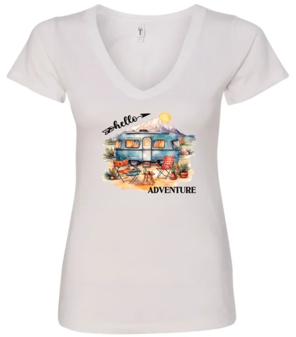 white camping v-neck t-shirt featuring a camper, picnic table set outside, and a sunrise in the background, and it says hello adventure