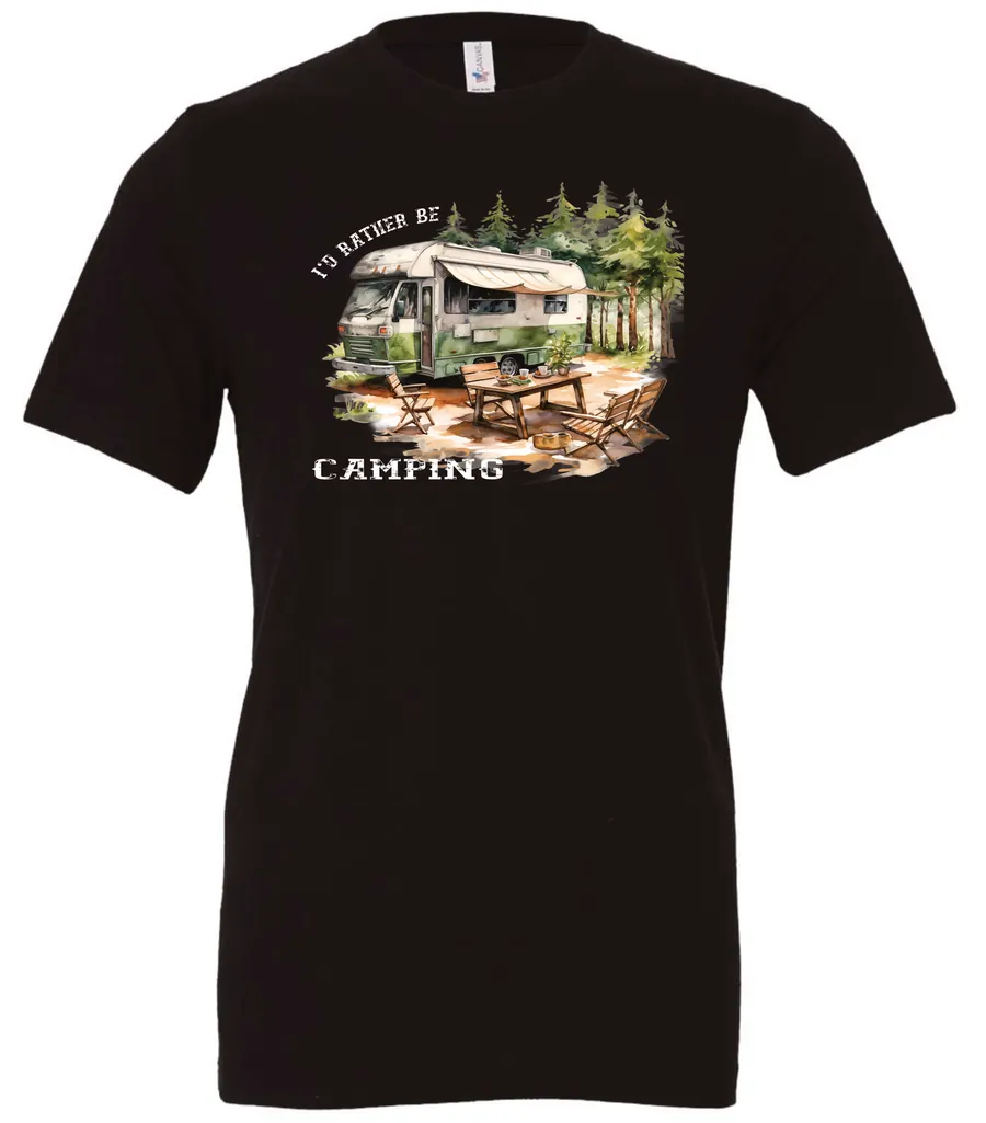 black camping t-shirt featuring an old model camper in the woods with a table and chairs outside, and it says I’d rather be camping