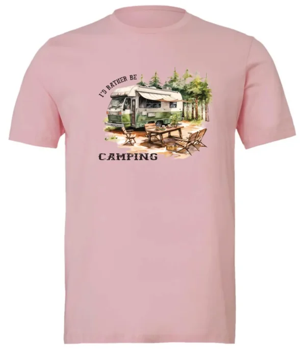 pink camping t-shirt featuring an old model camper in the woods with a table and chairs outside, and it says I’d rather be camping