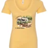 yellow camping v-neck t-shirt featuring an old model camper in the woods with a table and chairs outside, and it says I’d rather be camping