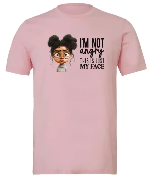 pink funny sarcastic t-shirt featuring a young black girl with two hair buns, glasses and angry face saying I'm not angry, this is just my face