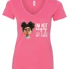 pink funny sarcastic v-neck t-shirt featuring a young black girl with two hair buns, glasses and angry face saying I'm not angry, this is just my face