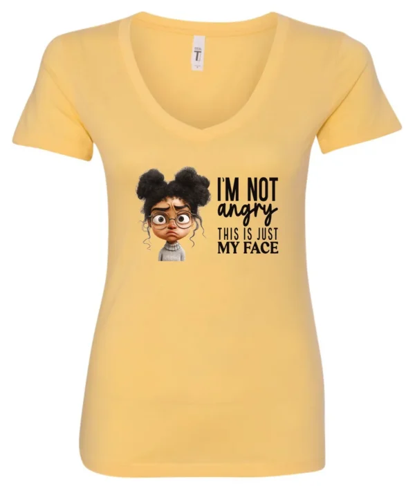 yellow funny sarcastic v-neck t-shirt featuring a young black girl with two hair buns, glasses and angry face saying I'm not angry, this is just my face