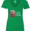 green funny v-neck t-shirt featuring an elderly woman with a look of astonishment, missing some teeth, her mouth open and her tongue sticking out, saying I need a long break from everything