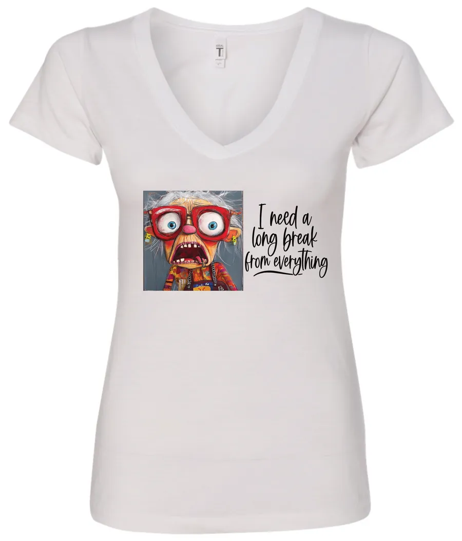 white funny v-neck t-shirt featuring an elderly woman with a look of astonishment, missing some teeth, her mouth open and her tongue sticking out, saying I need a long break from everything