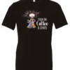 black caffeine t-shirt featuring a disheveled woman with a colorful coat mouth and eyes wide open and a cup of coffee it says I run on coffee and chaos