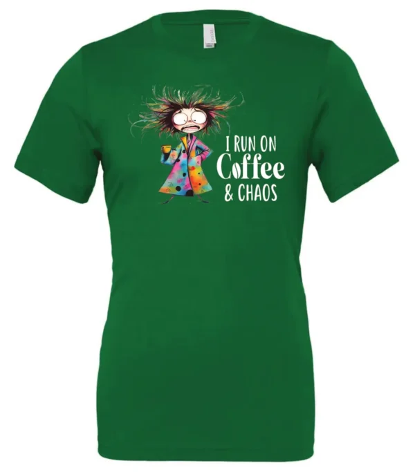 green caffeine t-shirt featuring a disheveled woman with a colorful coat mouth and eyes wide open and a cup of coffee it says I run on coffee and chaos