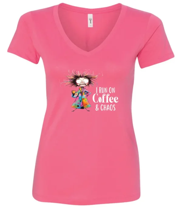 pink caffeine v-neck t-shirt featuring a disheveled woman with a colorful coat mouth and eyes wide open and a cup of coffee it says I run on coffee and chaos