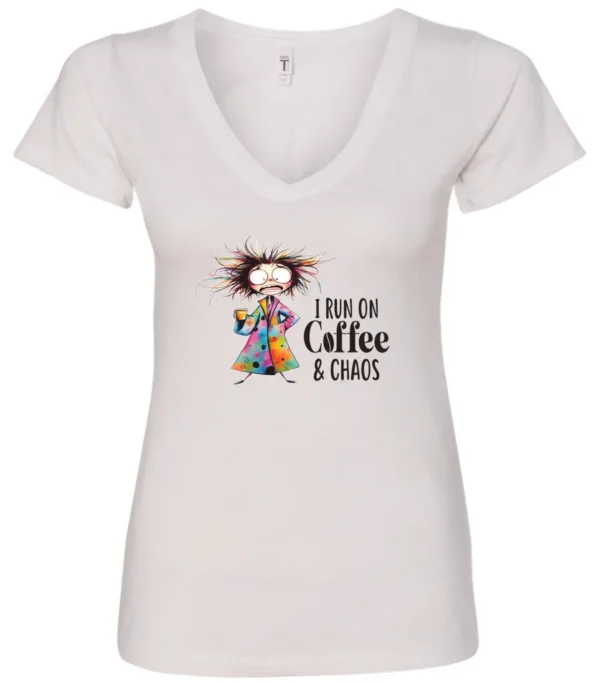 white caffeine v-neck t-shirt featuring a disheveled woman with a colorful coat mouth and eyes wide open and a cup of coffee it says I run on coffee and chaos