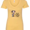 yellow caffeine v-neck t-shirt featuring a disheveled woman with a colorful coat mouth and eyes wide open and a cup of coffee it says I run on coffee and chaos