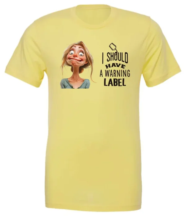 yellow humor t-shirt featuring a young blonde girl with an embarrassed face saying I should have a warning label