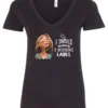 black humor v-neck t-shirt featuring a young blonde girl with an embarrassed face saying I should have a warning label