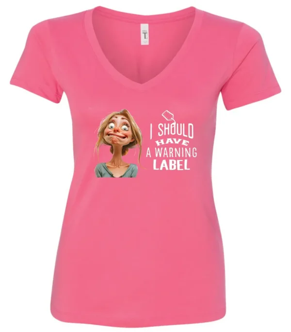 pink humor v-neck t-shirt featuring a young blonde girl with an embarrassed face saying I should have a warning label