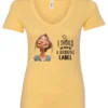 yellow humor v-neck t-shirt featuring a young blonde girl with an embarrassed face saying I should have a warning label