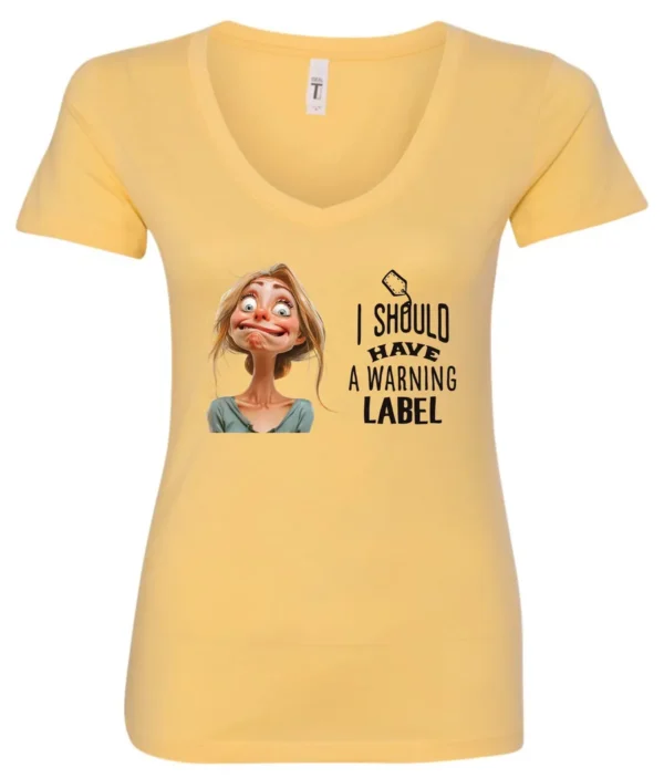 yellow humor v-neck t-shirt featuring a young blonde girl with an embarrassed face saying I should have a warning label