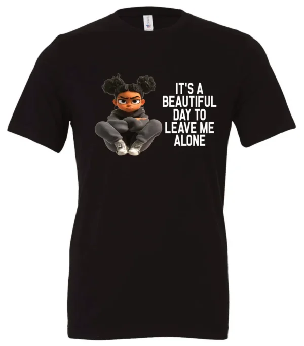 black sarcastic quote t-shirt featuring a young black girl with two hair buns, and mad face saying it’s a beautiful day to leave me alone